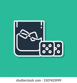 Blue Game dice and glass of whiskey with ice cubes icon isolated on green background. Casino gambling.  Vector Illustration