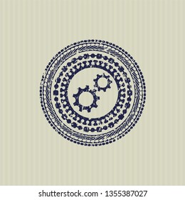Blue gear, team work icon inside distress rubber seal