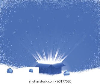 Blue gift box bursting with light on snowy winter snowflake background