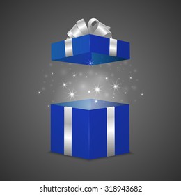 Blue gift box with a magic effect. Vector EPS10 illustration.