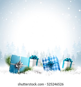 Blue gift boxes in the snow - Christmas greeting card with place for your message