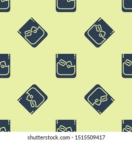 Blue Glass of whiskey and ice cubes icon isolated seamless pattern on yellow background.  Vector Illustration