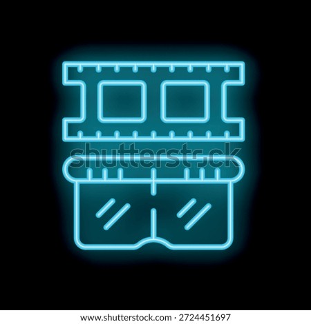 Blue glowing neon icon of a ram chip, representing computer memory and processing power