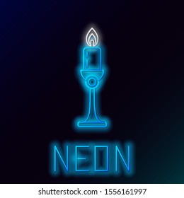 Blue glowing neon line Burning candle in candlestick icon on black background. Old fashioned lit candle. Cylindrical candle stick with burning flame. Colorful outline concept. Vector Illustration
