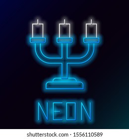 Blue glowing neon line Candlestick icon isolated on black background. Colorful outline concept. Vector Illustration