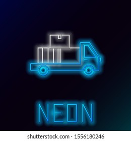 Blue glowing neon line Delivery truck with cardboard boxes behind icon isolated on black background. Colorful outline concept. Vector Illustration