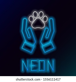 Blue glowing neon line Hands with animals footprint icon isolated on black background. Pet paw in heart. Love to the animals. Colorful outline concept. Vector Illustration
