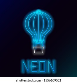 Blue glowing neon line Hot air balloon icon isolated on black background. Air transport for travel. Colorful outline concept. Vector Illustration