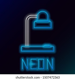 Blue glowing neon line Table lamp icon isolated on black background. Table office lamp. Colorful outline concept. Vector Illustration
