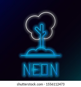 Blue glowing neon line Tree in the ground icon isolated on black background. Forest symbol. Colorful outline concept. Vector Illustration