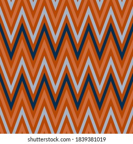 blue, gray, orange zigzag stripes are horizontally located on a red background. geometric seamless pattern. vector
