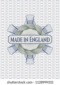 Blue and green abstract linear rosette with text Made in England inside