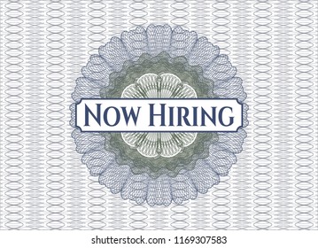 Blue and green abstract linear rosette with text Now Hiring inside