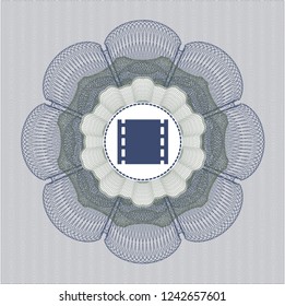 Blue and green abstract linear rosette with film icon inside