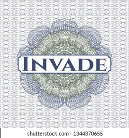 Blue and green abstract rosette with text Invade inside