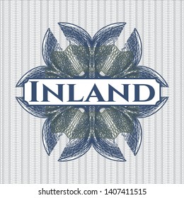 Blue and green abstract rosette with text Inland inside