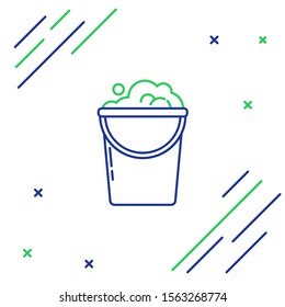 Blue and green line Bucket with foam and bubbles icon isolated on white background. Cleaning service concept. Colorful outline concept. Vector Illustration