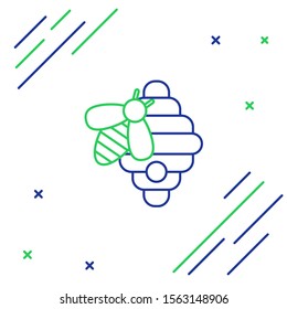Blue and green line Hive for bees icon isolated on white background. Beehive symbol. Apiary and beekeeping. Sweet natural food. Colorful outline concept. Vector Illustration