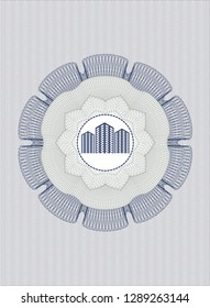 Blue and green linear rosette with buildings icon inside
