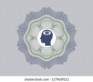 Blue and green linear rosette with head with jigsaw puzzle piece icon inside