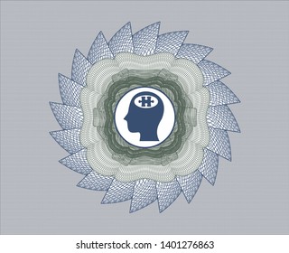 Blue and green linear rosette with head with jigsaw puzzle piece icon inside