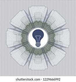 Blue and green linear rosette with light bulb icon inside