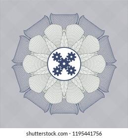Blue and green linear rosette with mechanism icon inside