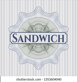 Blue and green linear rosette with text Sandwich inside