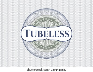 Blue and green linear rosette with text Tubeless inside