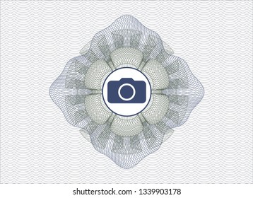 Blue and green money style emblem or rosette with photo camera icon inside