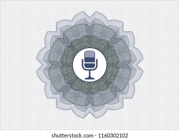 Blue and green money style rosette with microphone icon inside