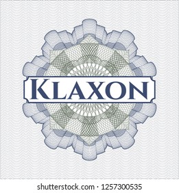 Blue and green money style rosette with text Klaxon inside