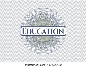 Blue and green passport money rossete with text Education inside