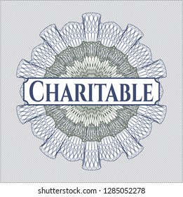 Blue and green passport money style rosette with text Charitable inside