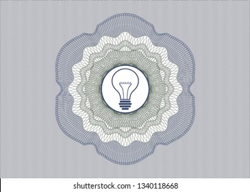 Blue and green passport rosette with idea icon inside