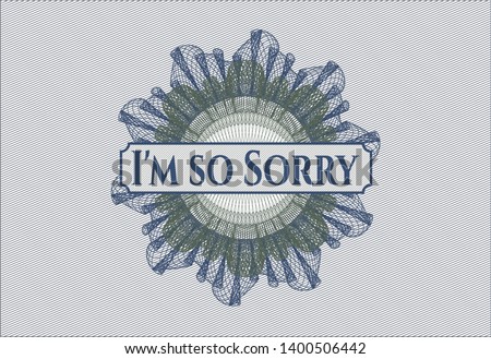 Blue and green passport rosette with text I'm so Sorry inside