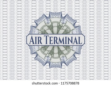Blue and green passport rossete with text Air Terminal inside