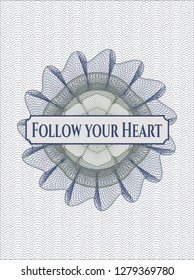 Blue and green passport style rosette with text Follow your Heart inside