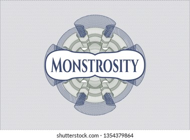 Blue and green passport style rosette with text Monstrosity inside