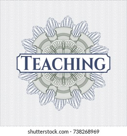Blue and green passport style rossete with text Teaching inside
