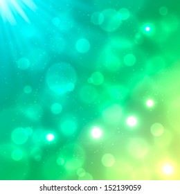 Blue and green shining background with bokeh effect