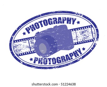 Blue grunge rubber stamp with filmstrip, camera and the word photography written inside 