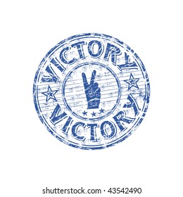 Blue grunge rubber stamp with the word victory written inside the stamp and two fingers from a hand showing the symbol of victory