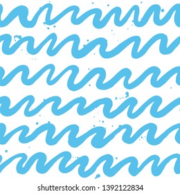Blue hand drawn wave or zigzag stroke and drops on white background. Seamless pattern paint brush style