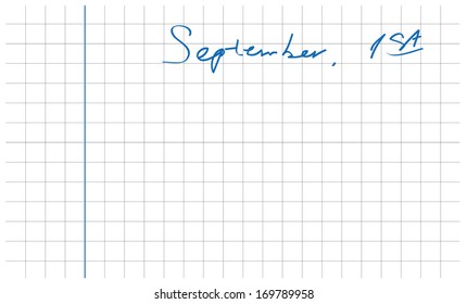 blue hand writing first september date on clean white notebook sheet squared
