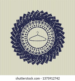 Blue hanger icon inside distressed grunge stamp