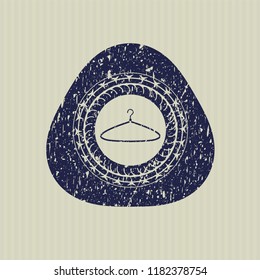 Blue hanger icon inside rubber grunge texture stamp