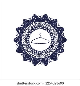 Blue hanger icon inside rubber texture