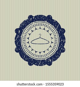 Blue hanger icon inside rubber seal