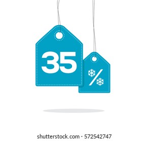 Blue hanging price tag labels with 35% text and snowflake percent design on them and with shadow isolated on white background. For winter sale campaigns. 
